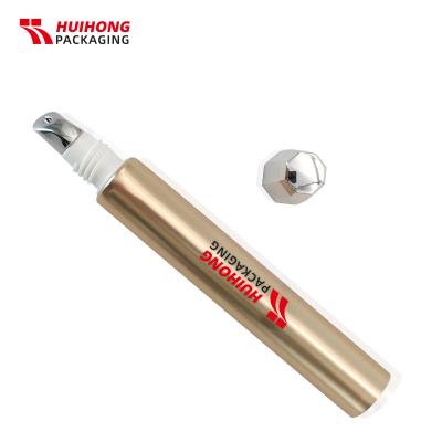 Tubo de crema de ojos de oro de 20 ml con aplicador de metal de aleación de zinc para cosméticos