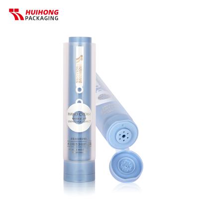 Tubo de doble cámara exprimidor de crema suave para manos azul personalizado con tapa abatible
